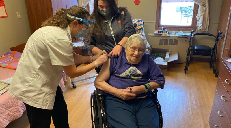 Mary Ann Herbst, a patient at the Good Samaritan Nursing Home in Mars, Iowa, receives her first dose of the COVID-19 vaccine on December 29, 2020. They have received at least one dose of the vaccine. -rao of COVID, which was released last fall.